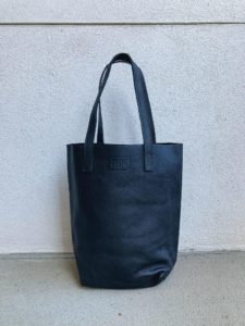 a black leather tote bag from ethic goods